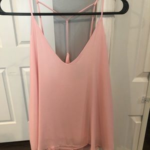 light pink tank top, tied of back